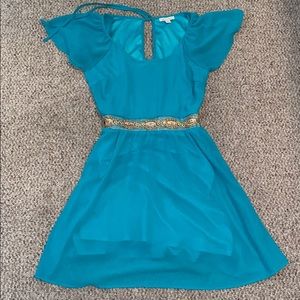 Green dress with gold bead detailing